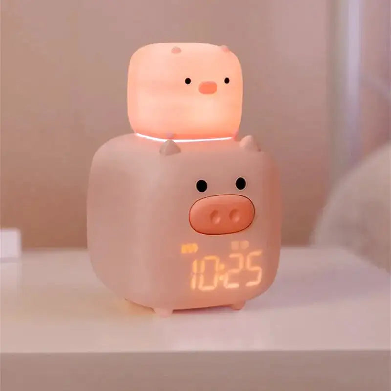 Réveil enfant en forme de cochons empilés rose pâle