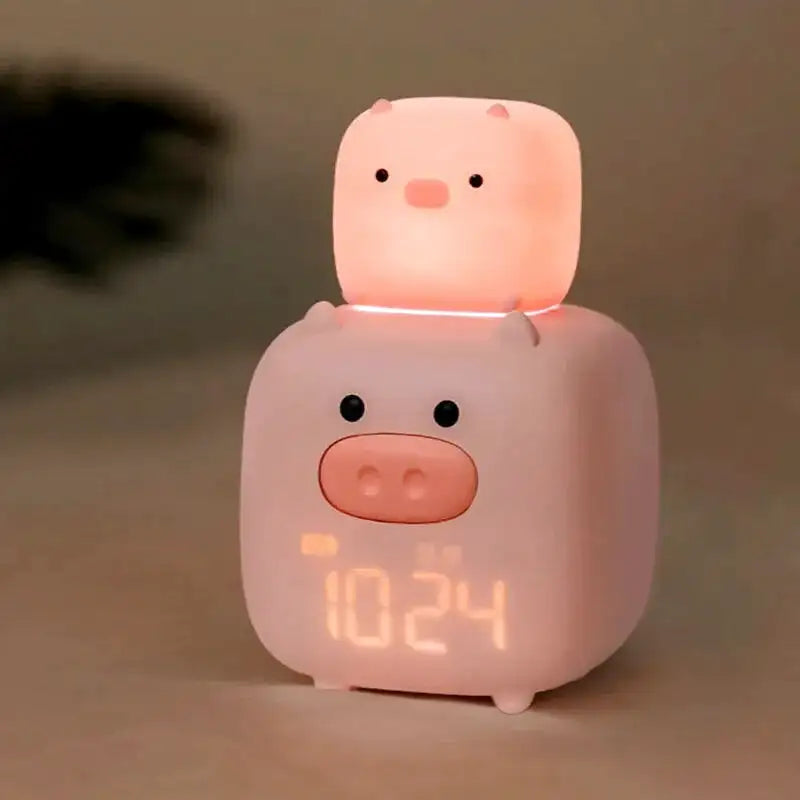 Réveil enfant en forme de cochons empilés rose pâle