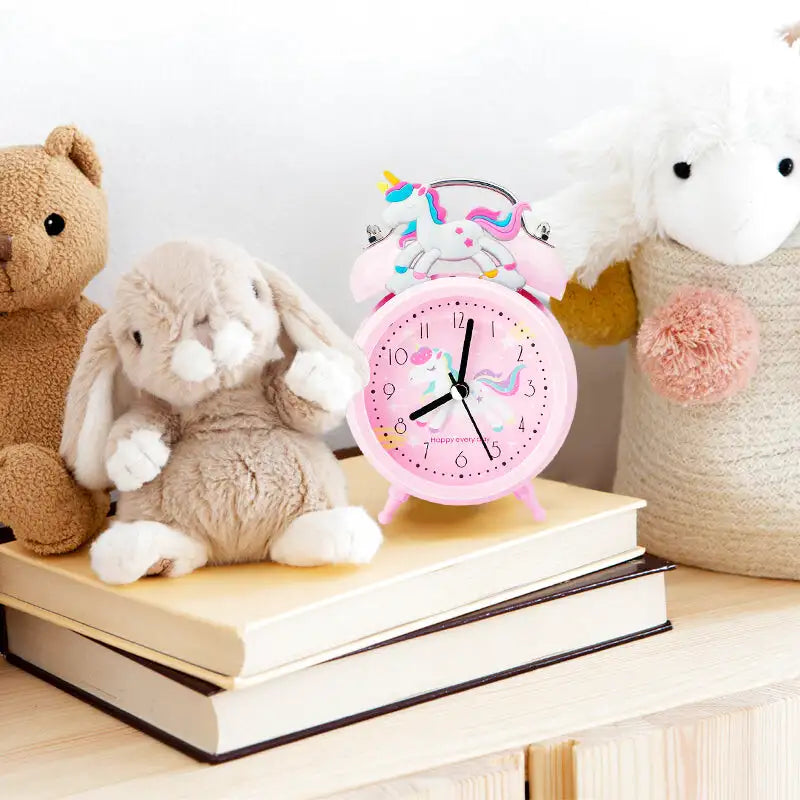 Réveil enfant rond en plastique rose motif licorne - Comptoir du Réveil -