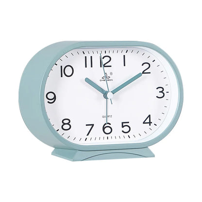 Réveil ovale rouge en plastique brillant -  - reveil-analogique-ovale - ["analogique","num\u00e9rique","petit","petit reveil","R\u00e9veil Analogique","simple"]