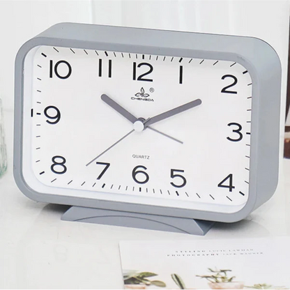 Réveil rectangulaire jaune mat avec coins arrondis -  - reveil-analogique-rectangle - ["analogique","petit","petit reveil","r\u00e9veil analogique","simple"]