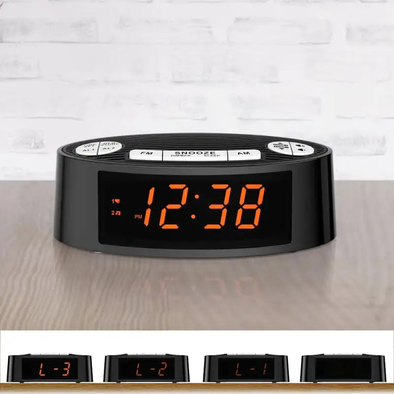 Radio réveil ovale noir à LED orange -  - radio-reveil-connecte-heure - ["connect\u00e9","digital","lumineux","num\u00e9rique","petit reveil","radio reveil","radio r\u00e9veil connect\u00e9","Radio R\u00e9veil Lumineux","r\u00e9veil connect\u00e9","r\u00e9veil digital","simple"]