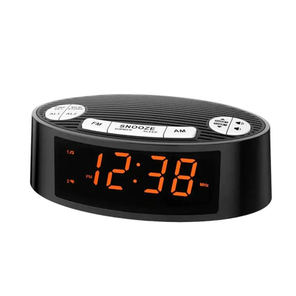 Radio réveil ovale noir à LED orange -  - radio-reveil-connecte-heure - ["connect\u00e9","digital","lumineux","num\u00e9rique","petit reveil","radio reveil","radio r\u00e9veil connect\u00e9","Radio R\u00e9veil Lumineux","r\u00e9veil connect\u00e9","r\u00e9veil digital","simple"]