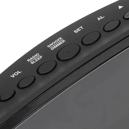 Radio réveil projecteur noir à LED rouges -  - radio-reveil-projecteur-rouge - ["digital","lumineux","petit","petit reveil","plastique","projecteur","Radio R\u00e9veil Lumineux","radio r\u00e9veil projecteur","r\u00e9veil digital","r\u00e9veil projecteur","simple"]