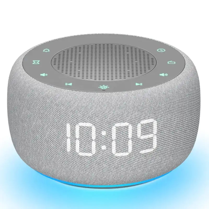 Radio réveil rond en tissu gris avec écran digital -  - radio-reveil-fm-numerique - ["ado","bluetooth","connect\u00e9","digital","lumineux","lumi\u00e8re","petit reveil","radio reveil","radio reveil connect\u00e9","Radio R\u00e9veil Lumineux","R\u00e9veil bluetooth","r\u00e9veil connect\u00e9","r\u00e9veil digital","simple"]