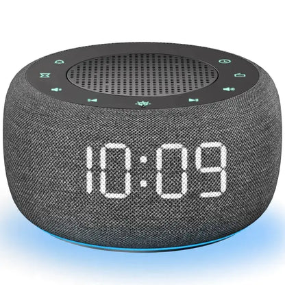 Radio réveil rond en tissu gris avec écran digital -  - radio-reveil-fm-numerique - ["ado","bluetooth","connect\u00e9","digital","lumineux","lumi\u00e8re","petit reveil","radio reveil","radio reveil connect\u00e9","Radio R\u00e9veil Lumineux","R\u00e9veil bluetooth","r\u00e9veil connect\u00e9","r\u00e9veil digital","simple"]