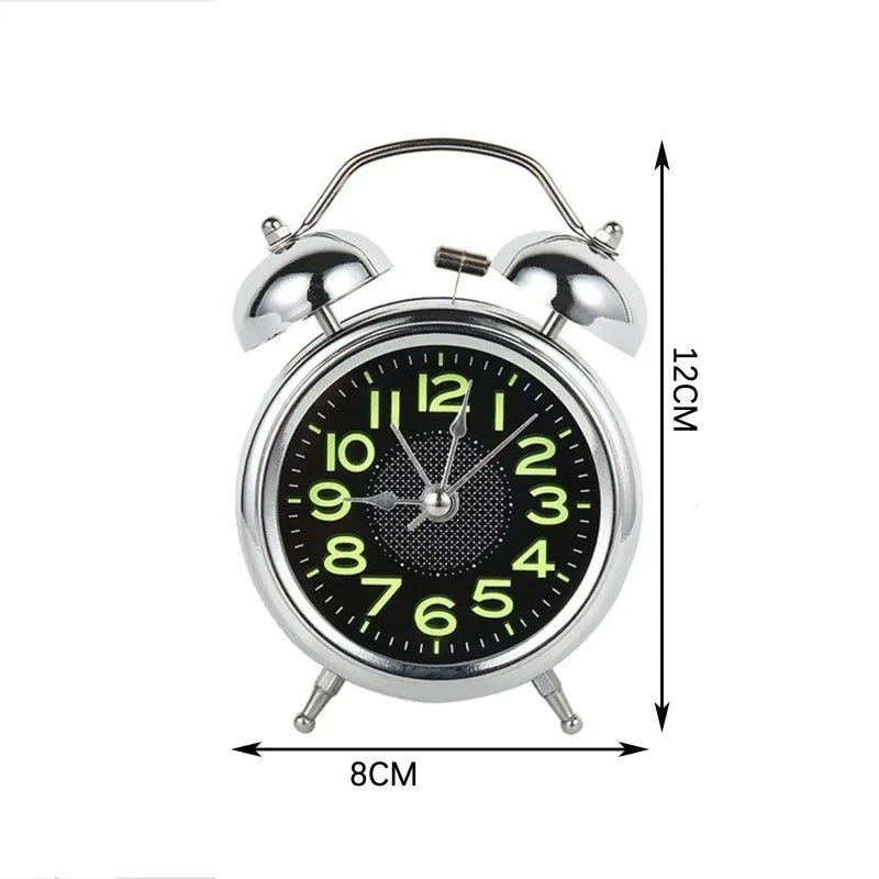 Réveil rond vintage en métal argenté à double cloche -  - reveil-a-pile-avec-chiffre-lumineux - ["analogique","Jour Nuit","lumineux","m\u00e9canique","petit","petit reveil","Radio R\u00e9veil Lumineux","R\u00e9veil Analogique","vintage"]