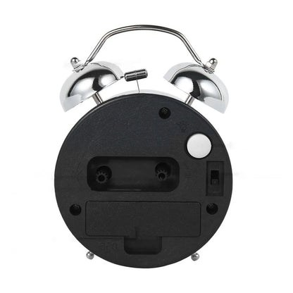 Réveil rond vintage en métal argenté à double cloche -  - reveil-a-pile-avec-chiffre-lumineux - ["analogique","Jour Nuit","lumineux","m\u00e9canique","petit","petit reveil","Radio R\u00e9veil Lumineux","R\u00e9veil Analogique","vintage"]