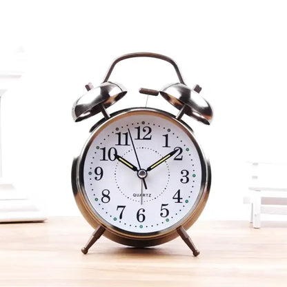 Réveil analogique vintage en métal argenté à double cloche -  - petit-reveil-vintage - ["analogique","m\u00e9canique","petit","R\u00e9veil Analogique","simple","vintage","voyage"]