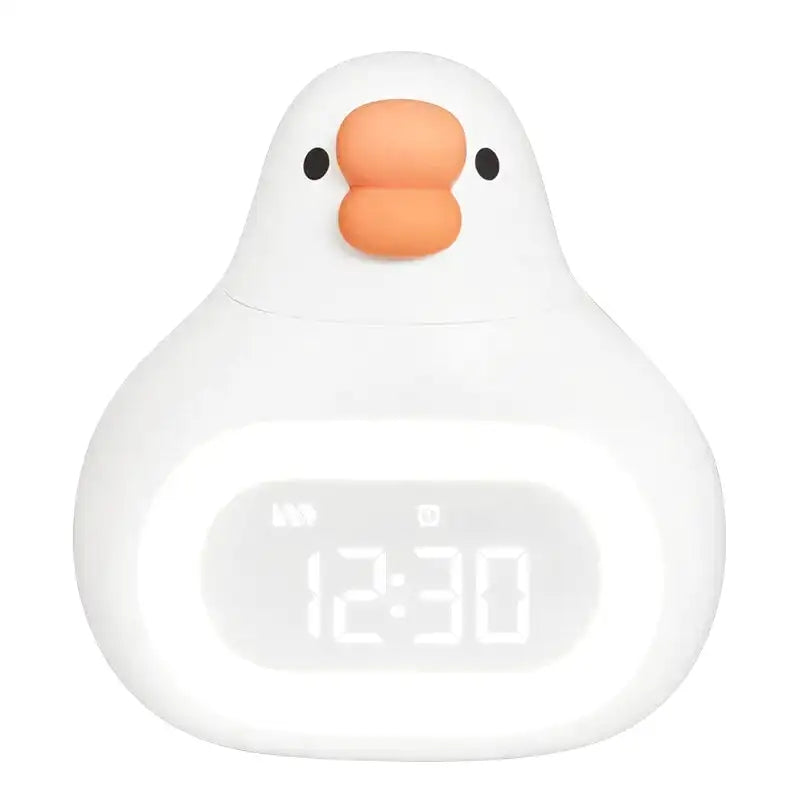 Réveil canard numérique en plastique jaune mat -  - reveil-enfant-avec-veilleuse - ["enfant","lumineux","lumi\u00e8re","num\u00e9rique","petit","r\u00e9veil digital","r\u00e9veil enfant","simple","veilleuse"]