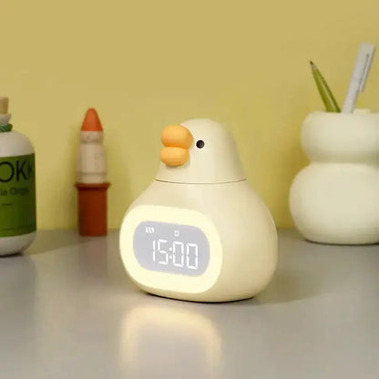 Réveil canard numérique en plastique jaune mat -  - reveil-enfant-avec-veilleuse - ["enfant","lumineux","lumi\u00e8re","num\u00e9rique","petit","r\u00e9veil digital","r\u00e9veil enfant","simple","veilleuse"]