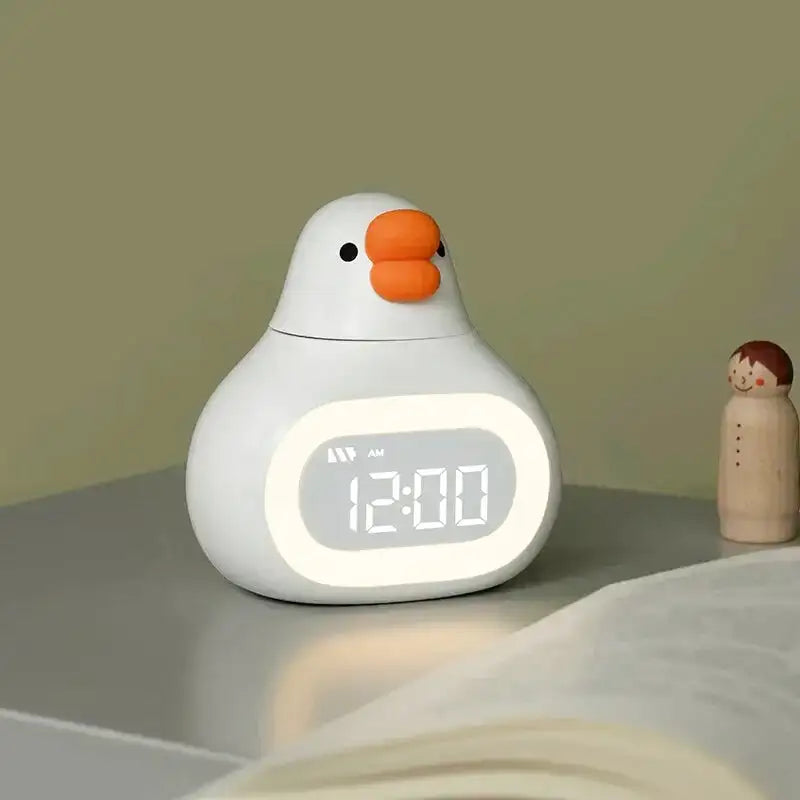 Réveil canard numérique en plastique jaune mat -  - reveil-enfant-avec-veilleuse - ["enfant","lumineux","lumi\u00e8re","num\u00e9rique","petit","r\u00e9veil digital","r\u00e9veil enfant","simple","veilleuse"]