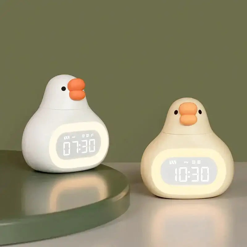 Réveil canard numérique en plastique jaune mat -  - reveil-enfant-avec-veilleuse - ["enfant","lumineux","lumi\u00e8re","num\u00e9rique","petit","r\u00e9veil digital","r\u00e9veil enfant","simple","veilleuse"]