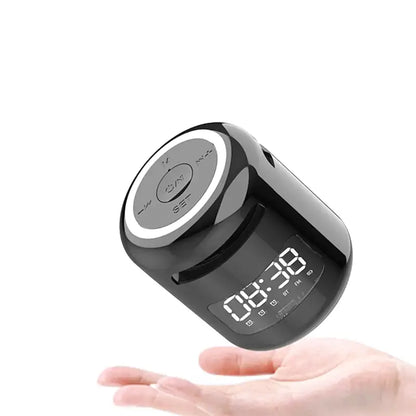 Réveil cylindrique numérique noir avec affichage blanc