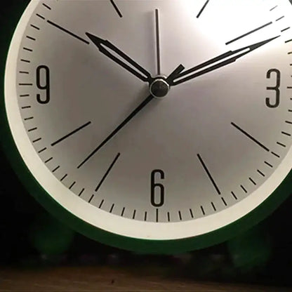 Réveil de table rond noir à face blanche