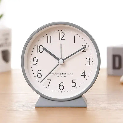 Réveil de table rond rose poudré et gris mat