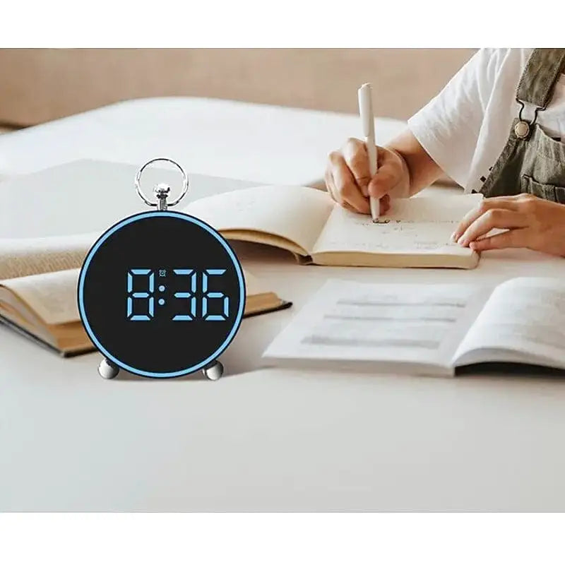 Réveil digital rond noir à affichage LED vert