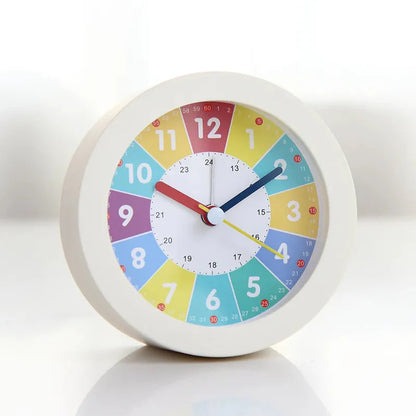 Réveil rond multicolore avec veilleuse intégrée -  - reveil-educatif-veilleuse - ["ado","analogique","couleur","enfant","petit","r\u00e9veil enfant","simple","\u00e9ducatif"]