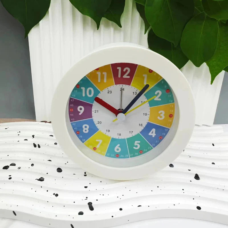 Réveil rond multicolore avec veilleuse intégrée -  - reveil-educatif-veilleuse - ["ado","analogique","couleur","enfant","petit","r\u00e9veil enfant","simple","\u00e9ducatif"]