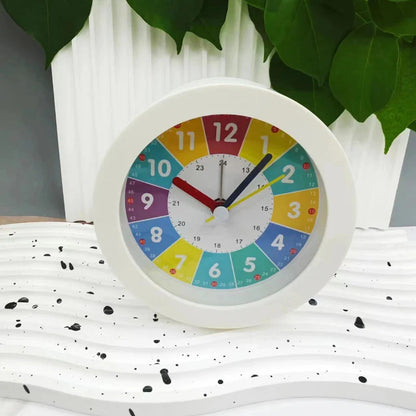 Réveil rond multicolore avec veilleuse intégrée -  - reveil-educatif-veilleuse - ["ado","analogique","couleur","enfant","petit","r\u00e9veil enfant","simple","\u00e9ducatif"]