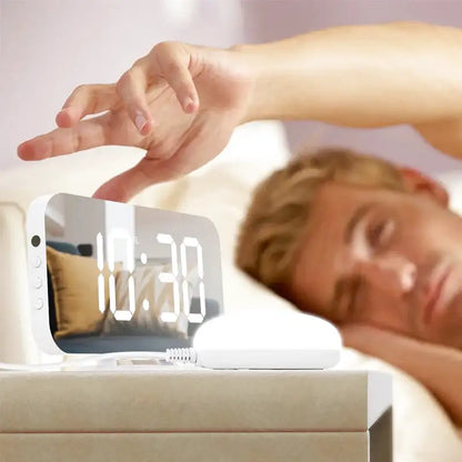 Réveil elliptique noir à surface miroir et LED blanc