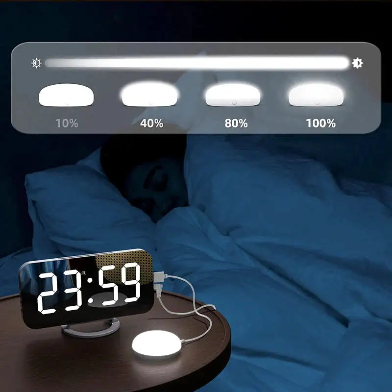 Réveil elliptique noir à surface miroir et LED blanc