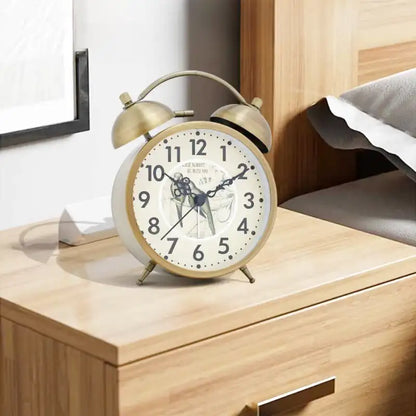 Réveil en métal doré motif floral vintage