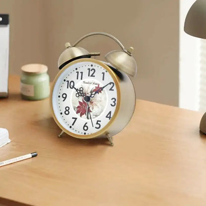 Réveil en métal doré motif floral vintage