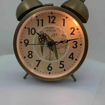 Réveil en métal doré motif floral vintage