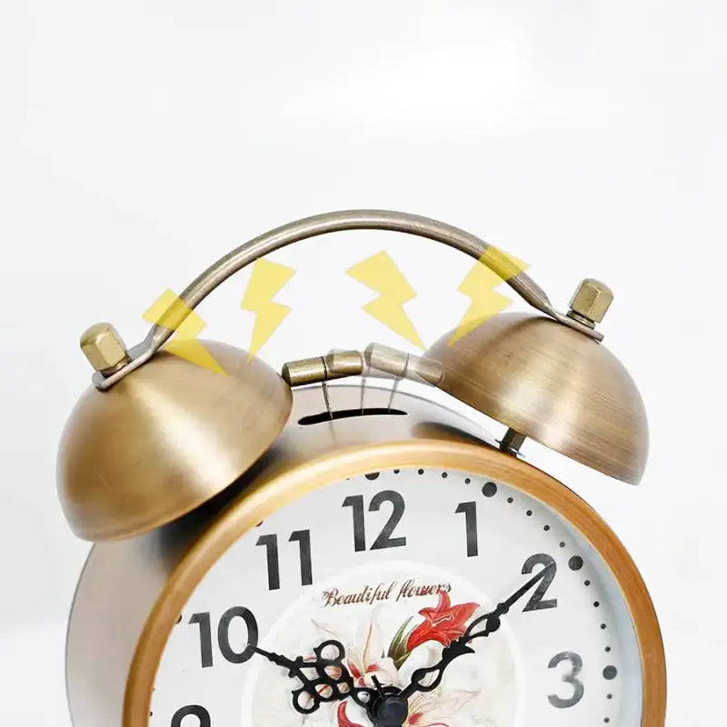 Réveil en métal doré motif floral vintage