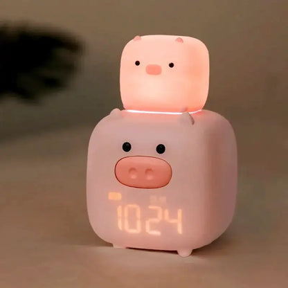 Réveil enfant en forme de cochons empilés rose pâle