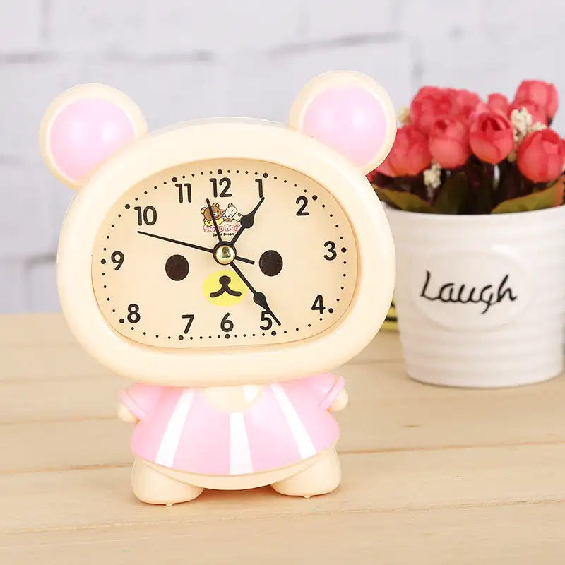 Réveil enfant ours rose en plastique brillant -  - reveil-enfant-analogique - ["analogique","enfant","fille","petit","rose","r\u00e9veil enfant","simple","\u00e9ducatif"]