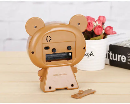 Réveil enfant ours rose en plastique brillant -  - reveil-enfant-analogique - ["analogique","enfant","fille","petit","rose","r\u00e9veil enfant","simple","\u00e9ducatif"]