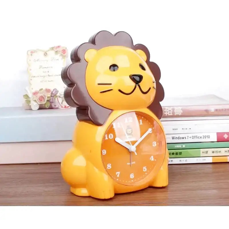 Réveil lion en plastique orange pour chambre d’enfant -  - reveil-enfant-lion - ["analogique","enfant","petit","r\u00e9veil enfant","simple","\u00e9ducatif"]