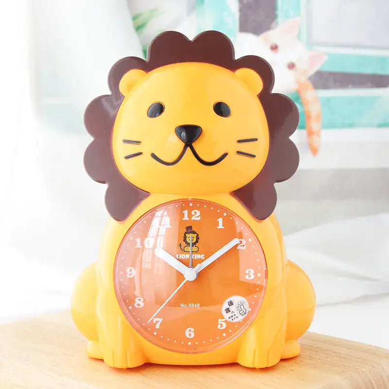 Réveil lion en plastique orange pour chambre d’enfant -  - reveil-enfant-lion - ["analogique","enfant","petit","r\u00e9veil enfant","simple","\u00e9ducatif"]