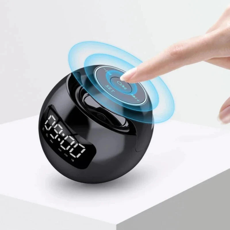 Réveil rond noir avec éclairage bleu et MP3 -  - reveil-luminotherapie-avec-mp3 - ["bluetooth","luminoth\u00e9rapie","R\u00e9veil bluetooth","veilleuse"]