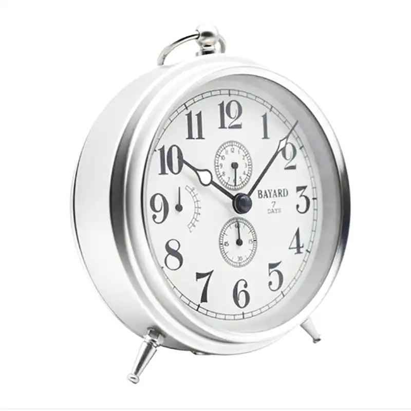 Réveil mécanique argenté avec dateur rétro -  - reveil-mecanique-vintage - ["Jour Nuit"]