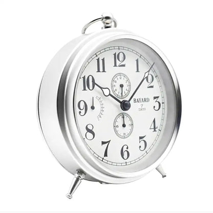 Réveil mécanique argenté avec dateur rétro -  - reveil-mecanique-vintage - ["Jour Nuit"]