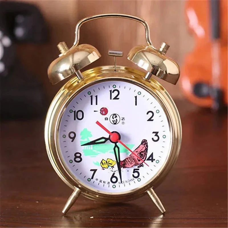 Réveil vintage doré avec illustrations d’enfants -  - reveil-mecanique-double-cloche - ["analogique","Jour Nuit","R\u00e9veil Analogique"]