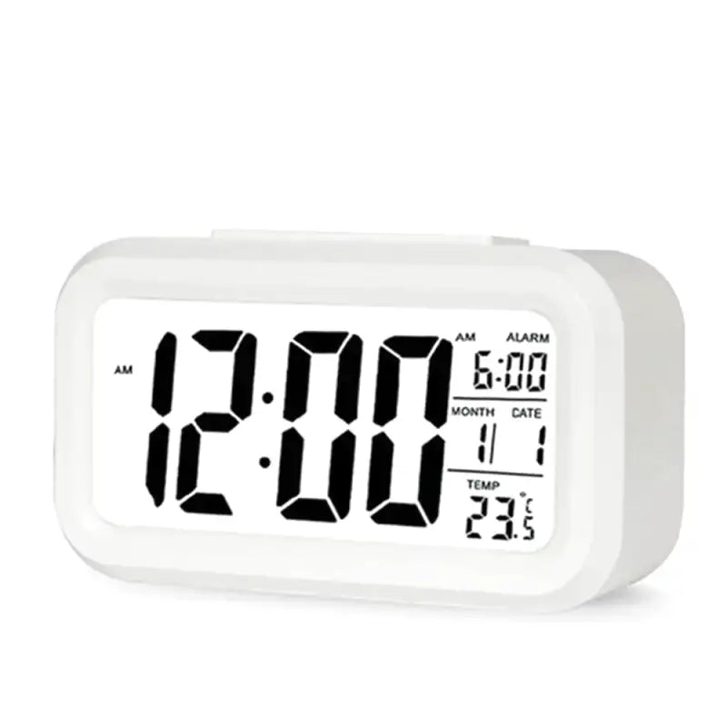 Réveil numérique compact noir avec affichage multifonction -  - reveil-a-pile-lumineux - ["digital","Jour Nuit","lumineux","num\u00e9rique","petit reveil","Radio R\u00e9veil Lumineux","r\u00e9veil digital","simple"]