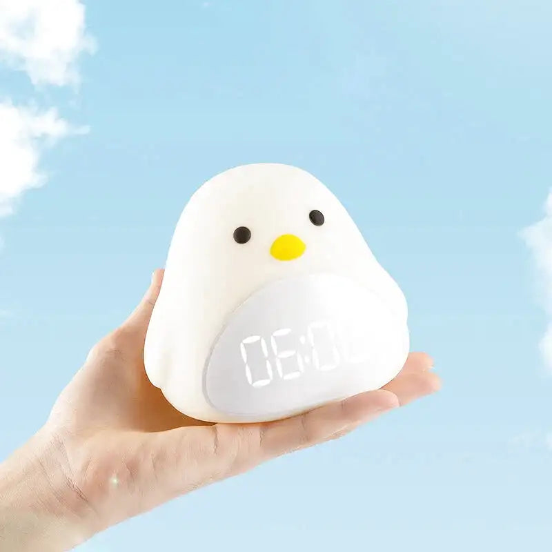 Réveil numérique enfant en forme d’oiseau blanc -  - reveil-enfant-jour-nuit - ["digital","enfant","lumineux","num\u00e9rique","petit","petit reveil","r\u00e9veil enfant","simple"]