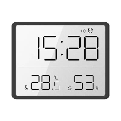 Réveil numérique noir avec température et humidité intégrées -  - reveil-de-voyage-avec-alarme - ["digital","num\u00e9rique","petit","r\u00e9veil digital","simple"]