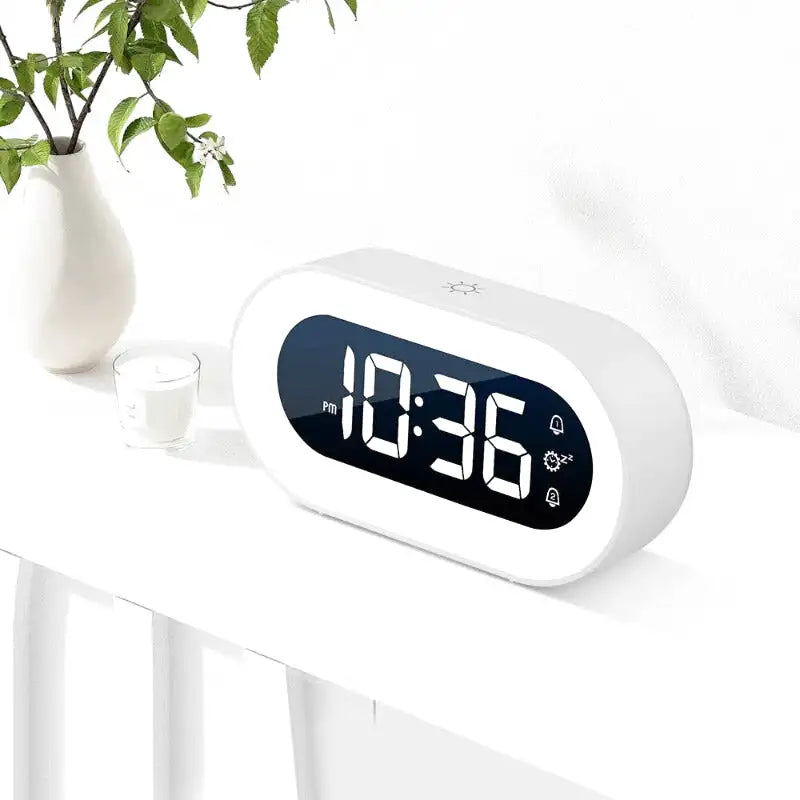 Réveil numérique ovale noir avec affichage LED blanc -  - reveil-numerique-design-avec-eclairage-led - ["veilleuse"]