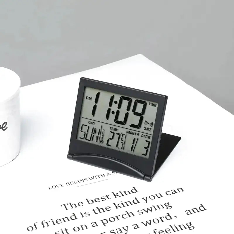 Réveil numérique pliable noir avec affichage multifonction -  - reveil-de-voyage-pliable - ["digital","num\u00e9rique","petit reveil","plastique","r\u00e9veil digital","simple","voyage"]