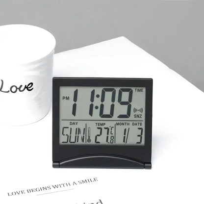 Réveil numérique pliable noir avec affichage multifonction -  - reveil-de-voyage-pliable - ["digital","num\u00e9rique","petit reveil","plastique","r\u00e9veil digital","simple","voyage"]