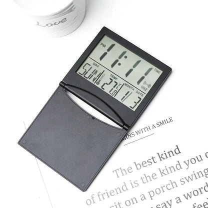 Réveil numérique pliable noir avec affichage multifonction -  - reveil-de-voyage-pliable - ["digital","num\u00e9rique","petit reveil","plastique","r\u00e9veil digital","simple","voyage"]