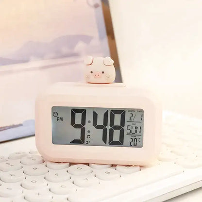 Réveil numérique rose avec figurine cochon décorative -  - reveil-fille-10-ans-rose-poudre - ["ado"]