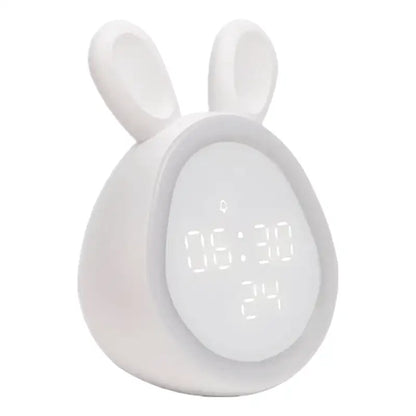 Réveil numérique rose en forme de lapin -  - reveil-enfant-lumiere - ["ado","enfant","fille","lapin","lumineux","num\u00e9rique","petit reveil","rose","r\u00e9veil digital","r\u00e9veil enfant","simple","veilleuse"]