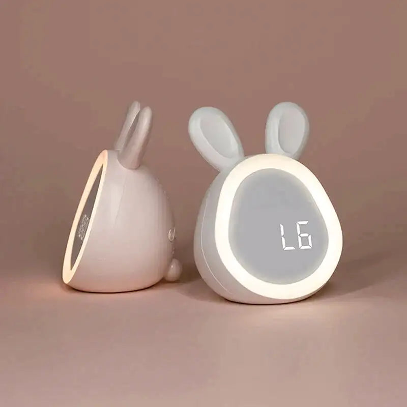Réveil numérique rose en forme de lapin -  - reveil-enfant-lumiere - ["ado","enfant","fille","lapin","lumineux","num\u00e9rique","petit reveil","rose","r\u00e9veil digital","r\u00e9veil enfant","simple","veilleuse"]