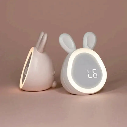 Réveil numérique rose en forme de lapin -  - reveil-enfant-lumiere - ["ado","enfant","fille","lapin","lumineux","num\u00e9rique","petit reveil","rose","r\u00e9veil digital","r\u00e9veil enfant","simple","veilleuse"]